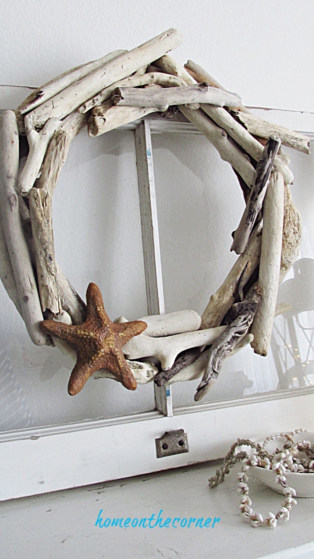 driftwood wreath mantle and shells